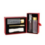 CARTIER - two jewellery cleaning kits. To include cleaning gel and lotion, a cloth and a brush. With