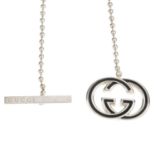 GUCCI - a necklace. Designed as a black enamelled GG monogram pendant on a silver-tone bead