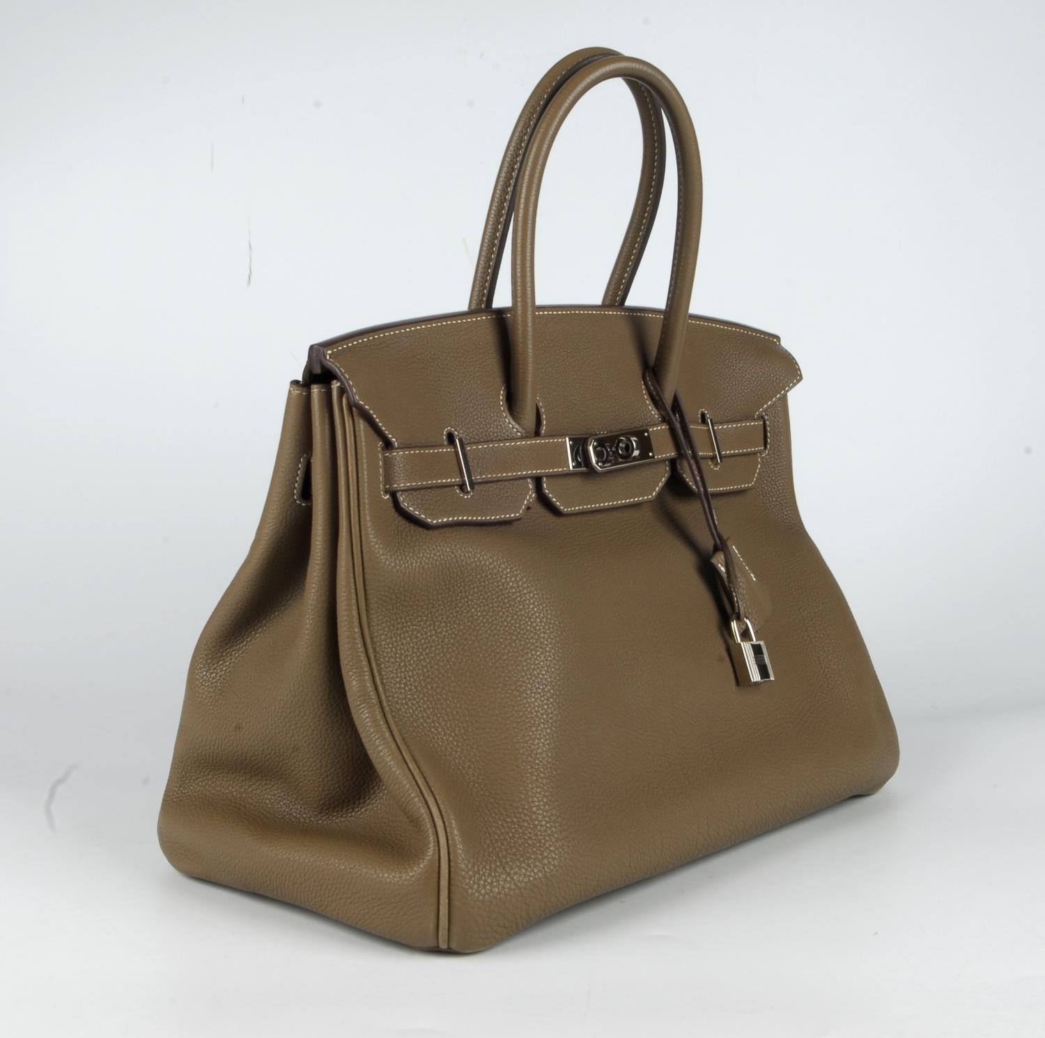 HERMÈS - a 2009 taupe Fjord Birkin 35 handbag. Featuring a grained fjord leather exterior, dual - Image 5 of 8