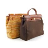 HERMÈS - a Vibrato Herbag handbag. Designed as a two in one handbag with interchangeable
