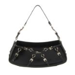 CHRISTIAN DIOR - a black coated leather baguette handbag. Designed with polished silver-tone