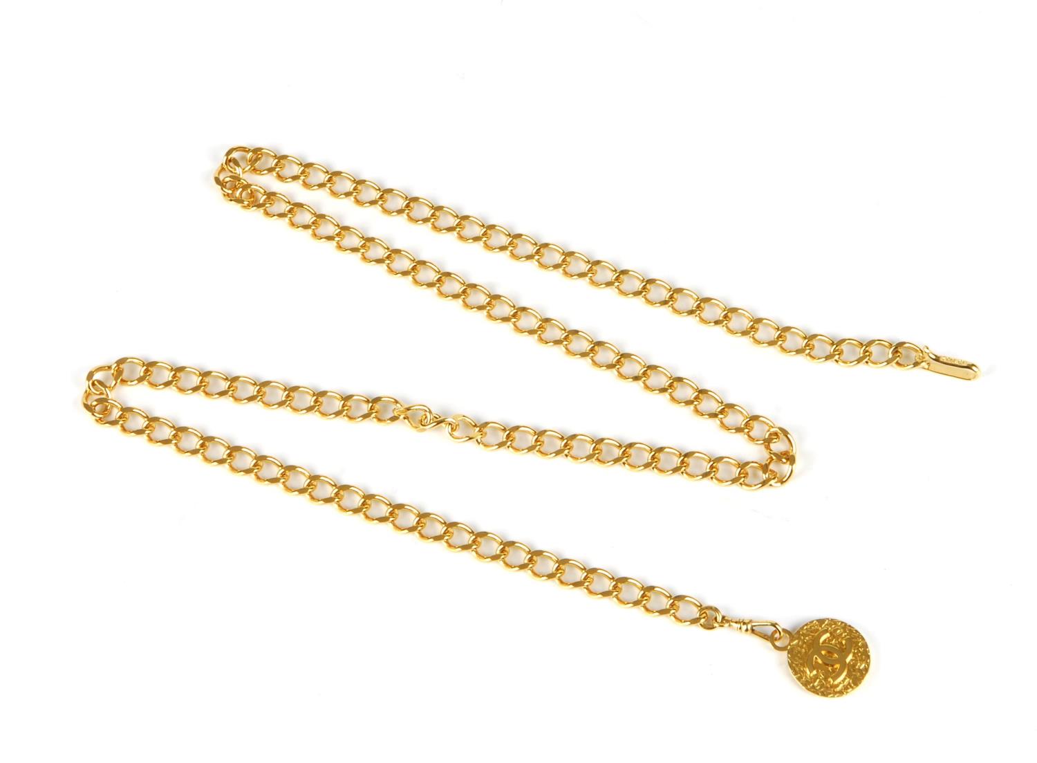 CHANEL - a chain belt. Featuring a gold-tone chain with a large logo CC medallion hanging at one end - Image 2 of 3