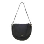 BOTTEGA VENETA - a vintage handbag. Designed with a black nylon and suede exterior, featuring a