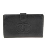 CHANEL - a Caviar leather wallet. The caviar leather exterior with quilted CC logo to the front,