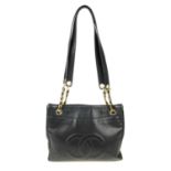 CHANEL - a Caviar leather handbag. The square tote with embroidered CC logo to the front flat