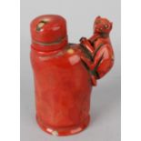 A 20th century stained coral scent bottle, modelled as a monkey on a stylised tree stump, 3 (7.