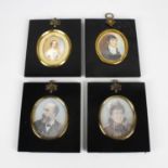 Four oval portrait miniatures on ivory, three head and shoulder studies, one of a bearded gentleman,