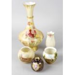Four assorted Worcester porcelain vases. Comprising: a blush ivory vase of bulbous form with seven-