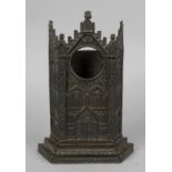 A 19th century bronzed pocket watch stand, formed as the facade of a gothic building, 8.5 (21.5cm)