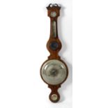 A mid 19th century mahogany wheel barometer. The 9.5-inch silvered main dial, with engraved