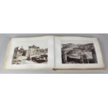 Italian interest: An album of photographs of Rome. Circa 1900, the vellum-bound album gilt-