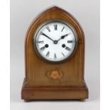 An early 20th century inlaid mahogany mantel clock. Having a 5.25-inch white-enamelled convex