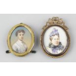 Two early 20th century oval miniatures. The first probably on ivory, depicting a lady with parted