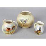 A group of seven Worcester bird-painted blush ivory porcelain items. Comprising: a Royal Worcester