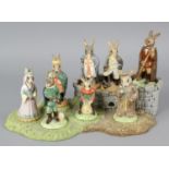 A collection of eight Royal Doulton Bunnykins 'Robin Hood Collection' figures, comprising Little