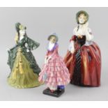 A group of three Royal Doulton figurines, comprising Priscilla HN 1340, Classic Movies Gone with the