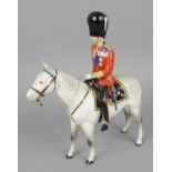 A Beswick china ornament modelled as His Royal Highness The Duke of Edinburgh, mounted on '