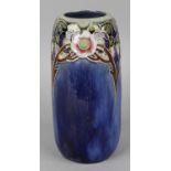 A Royal Doulton stoneware vase, of tapered ovoid shaped form, the blue glazed ground decorated