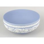 A Wedgwood blue jasperware bowl of Australian interest, the body of circular form decorated with