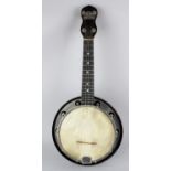 A George Formby registered banjolele, with typical plaque to headstock, faint sepia ink signature to