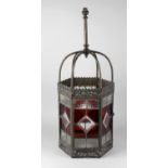 An Arts and Crafts lantern, c. 1900, the pierced and floral embossed sheet copper body, of hexagonal