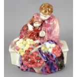 A Royal Doulton figure group 'Flower Sellers Children' HN 1342, 8 (20.25cm) high. Chip to flowers,