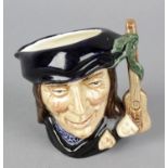 A Royal Doulton character jug 'Scaramouche' D6564, the handle modelled as a guitar with the two