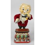 A collection of assorted items to include a Japanese battery operated 'Bartender' novelty toy in