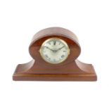 An early 20th century mahogany mantel clock. Gilbert, retailed by 'The Northern Goldsmiths Co.,