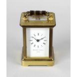 A Matthew Norman brass-cased 'mignonette' miniature carriage clock. The 1.5-inch white Roman dial