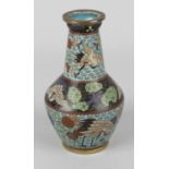 A cloisonné vase, the body of baluster form with tapering neck, decorated with flowers and cranes