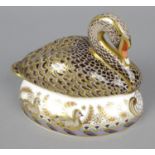 A Royal Crown Derby porcelain paperweight modelled as a black swan, a numbered limited edition (