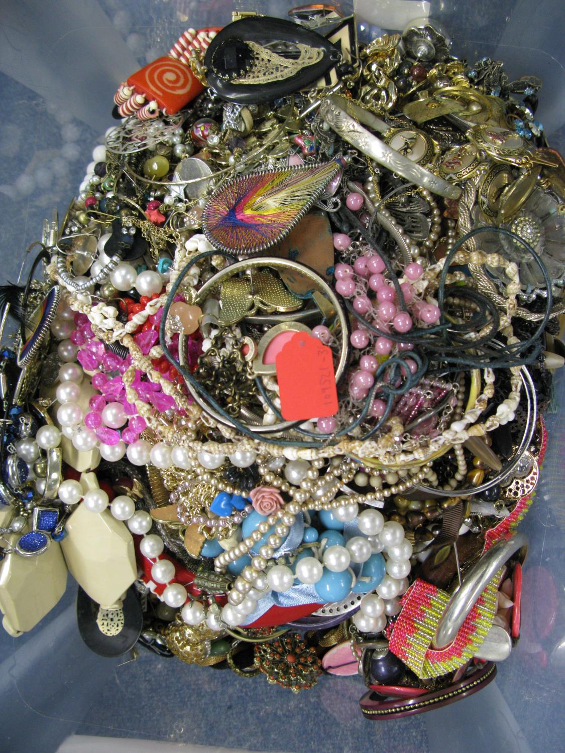 A bag containing a large quantity of costume jewellery. Many AF. Weight approximately 11kg. Due to - Image 2 of 2