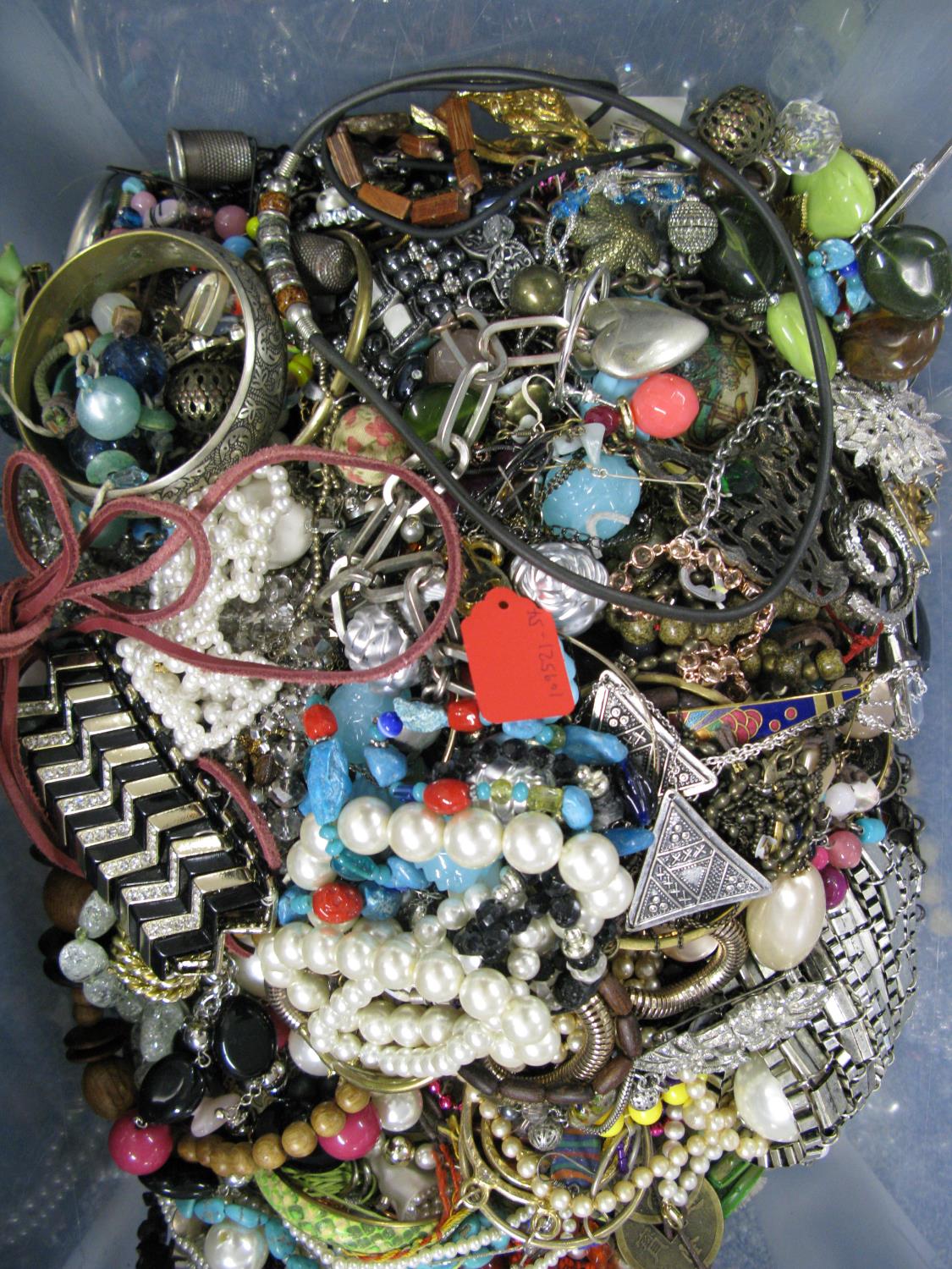 A bag containing a large quantity of costume jewellery. Many AF. Weight approximately 13kg. Due to - Image 2 of 2