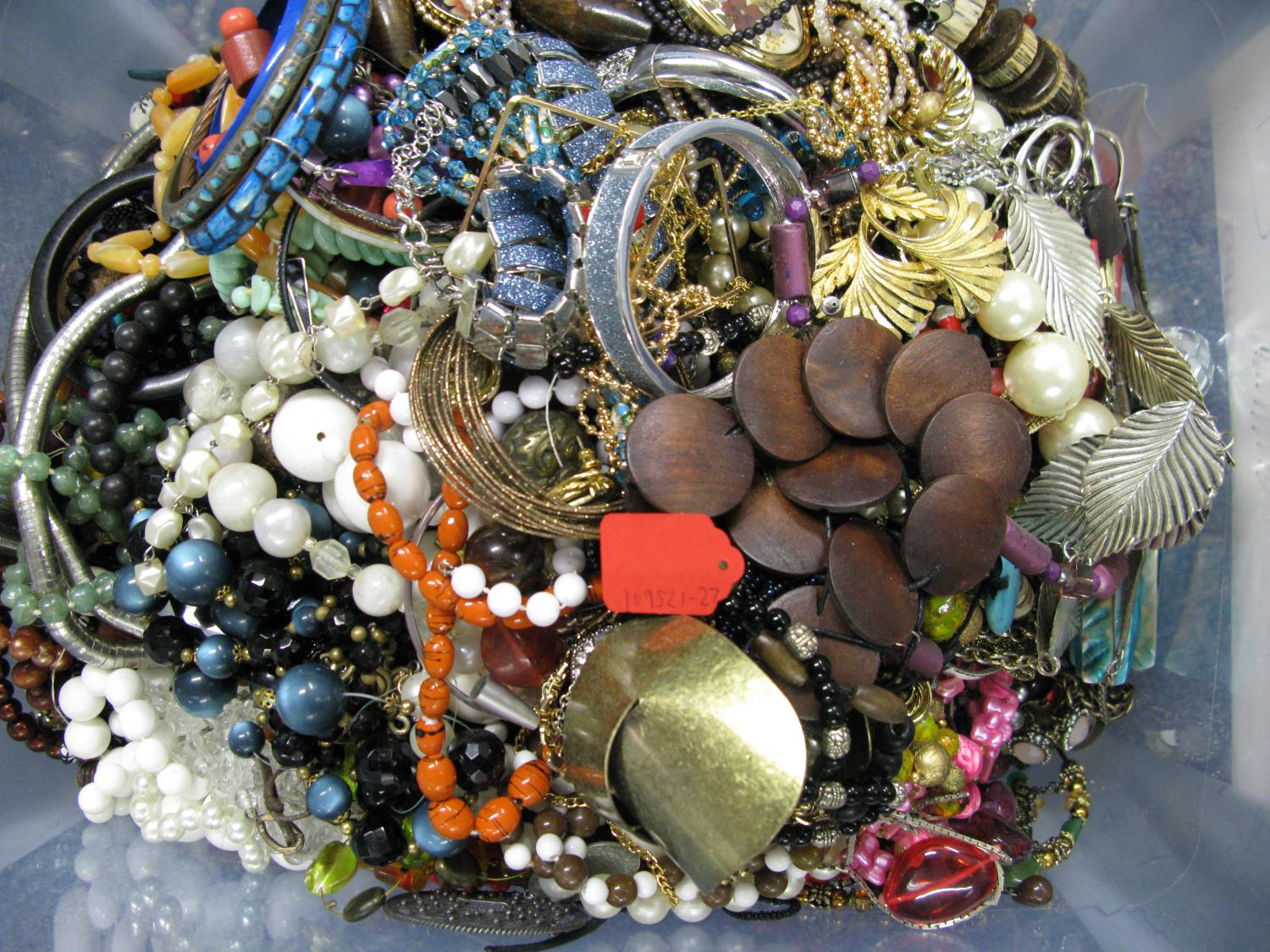 A bag containing a large quantity of costume jewellery. Many AF. Weight approximately 11kg. Due to - Image 2 of 2