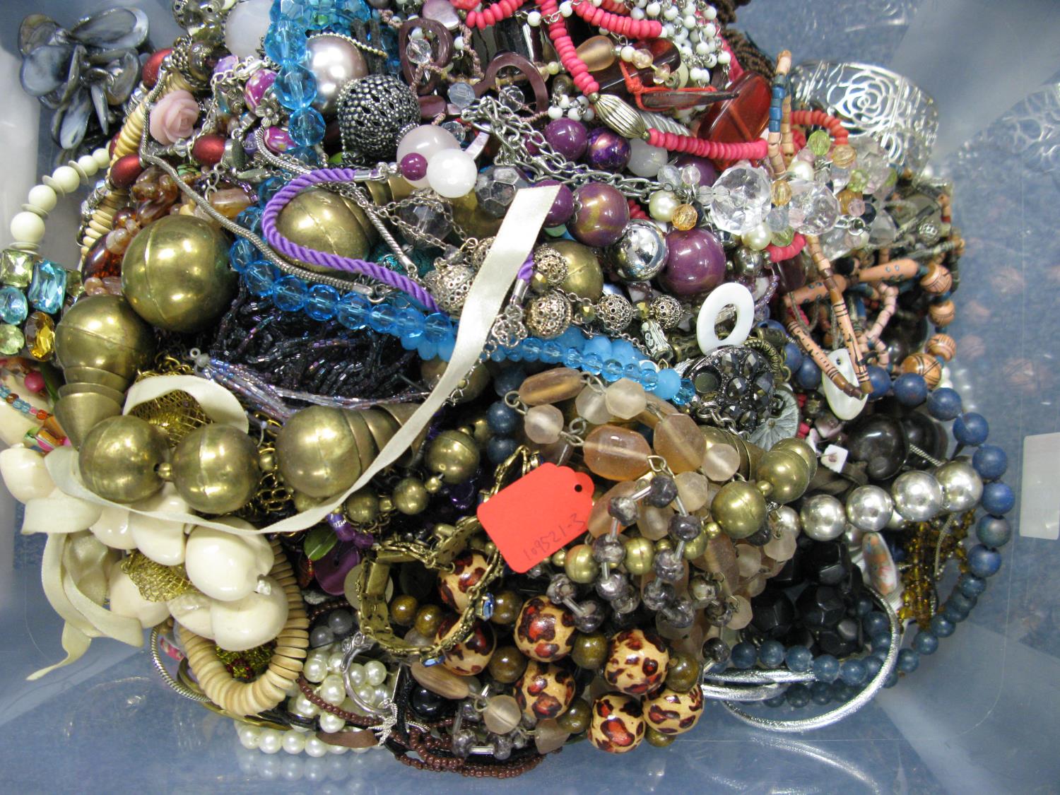 A bag containing a large quantity of costume jewellery. Many AF. Weight approximately 12kg. Due to - Image 2 of 2