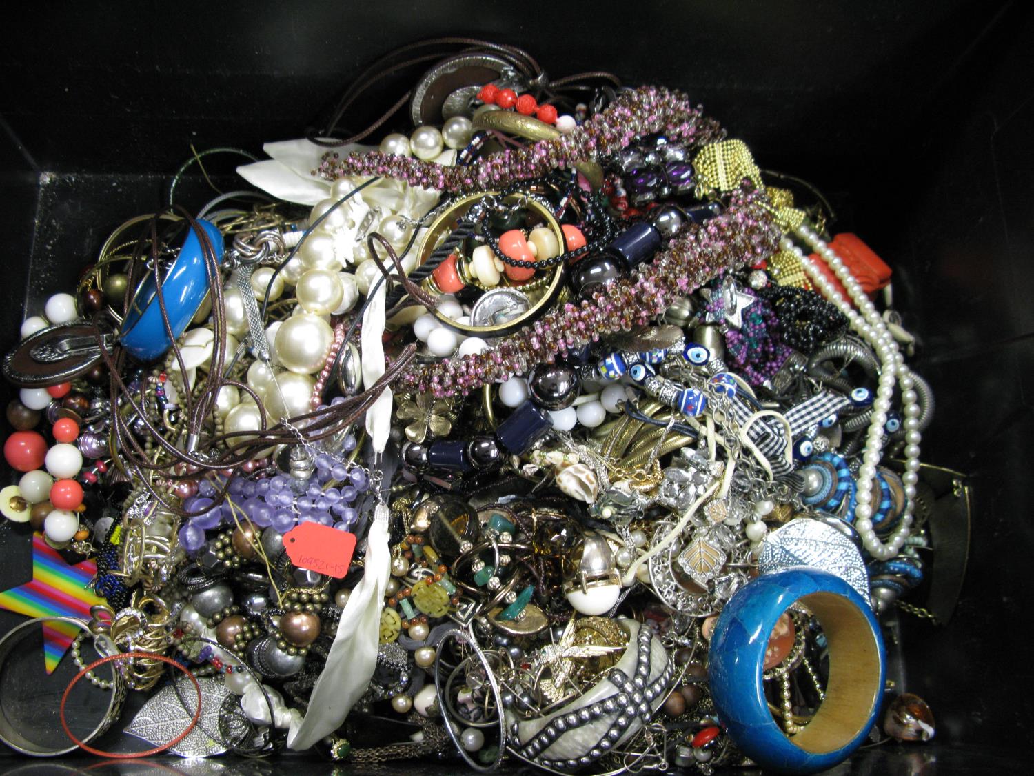 A bag containing a large quantity of costume jewellery. Many AF. Weight approximately 11kg. Due to - Image 2 of 2