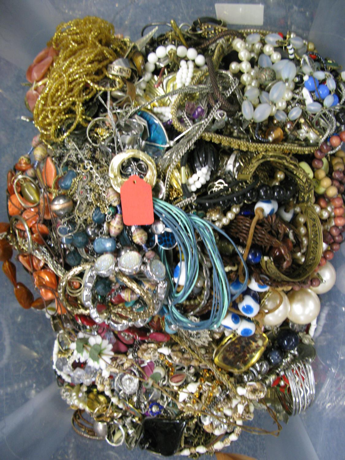 A bag containing a large quantity of costume jewellery. Many AF. Weight approximately 10kg. Due to - Image 2 of 2