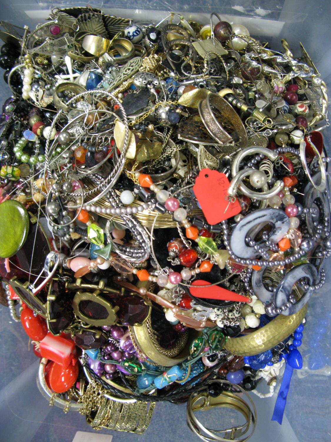 A bag containing a large quantity of costume jewellery. Many AF. Weight approximately 13kg. Due to - Image 2 of 2