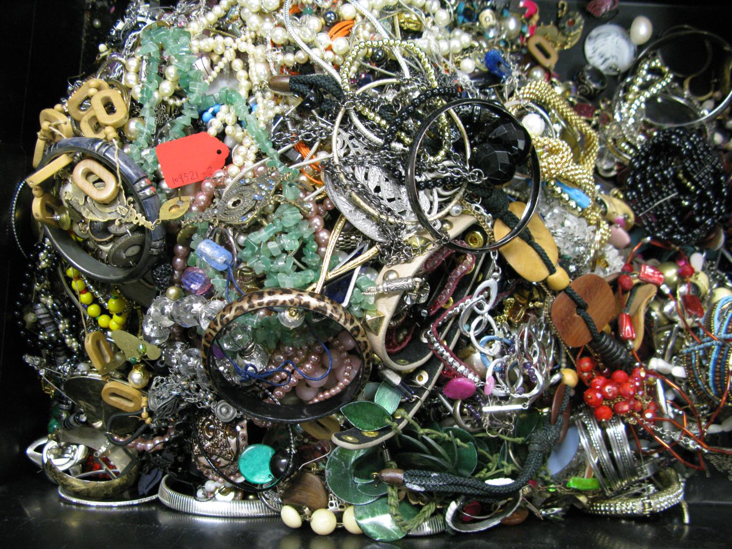 A bag containing a large quantity of costume jewellery. Many AF. Weight approximately 12.5kg. Due to - Image 2 of 2