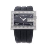 GUCCI - a lady's 235 wrist watch. Stainless steel case with factory diamond set bezel. Reference
