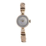 OMEGA - a lady's bracelet watch. 9ct yellow gold case, hallmarked Birmingham 1959. Signed manual