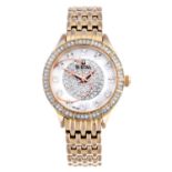 BULOVA - a lady's bracelet watch. Gold plated case with stainless steel case back and factory