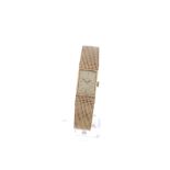 OMEGA - a lady's 9ct yellow gold bracelet watch.