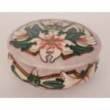 A Moorcroft Pottery Blakeney Mallow pattern powder bowl and cover designed by Sarah Brummell-Bailey,