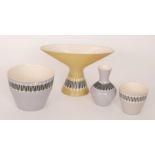 Four pieces of Hornsea Slipware designed by John Clappison comprising an olive green vase of