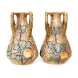 Amphora - A pair of early 20th Century Jugendstil vases each decorated with yellow roses and