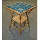 In the manner of Liberty and Co - A bamboo framed occasional table of square form,