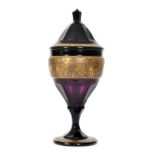 Moser Karlsbad - An amethyst glass chalice and cover circa 1920 with circular spread foot,