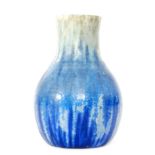 Ruskin Pottery - A 1930s crystalline glaze vase decorated in blue over a cream ground with a green